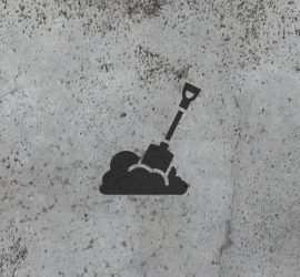 Imagen con fondo de cemento y un logo de una pala en un monto de tierra